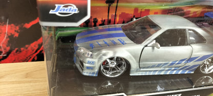 Jada Toys 1/24 Nissan Skyline BNR34 Brian Fast & Furious wersja BRUSCH 25th Anniversary